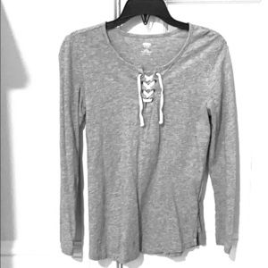 Gray lace up long-sleeve tee.